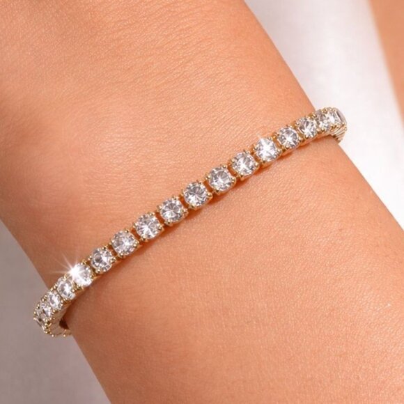 Swarovski Jewelry - Slider Tennis Bracelet 14K Gold Overlay Adjustable Made with Swarovski Crystals